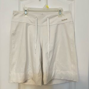 Selling white Reebok shorts
